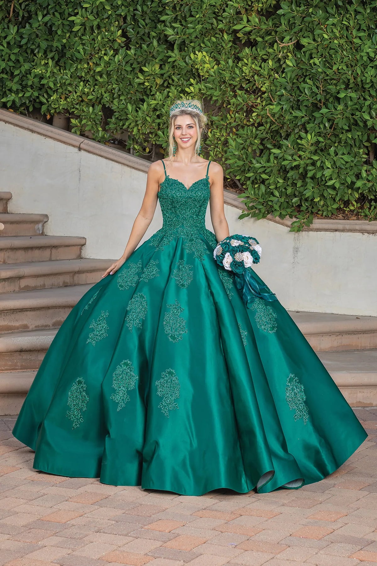 Featuring a floor-length skirt, this Hunter Green quinceañera ball gown is shown in full view.