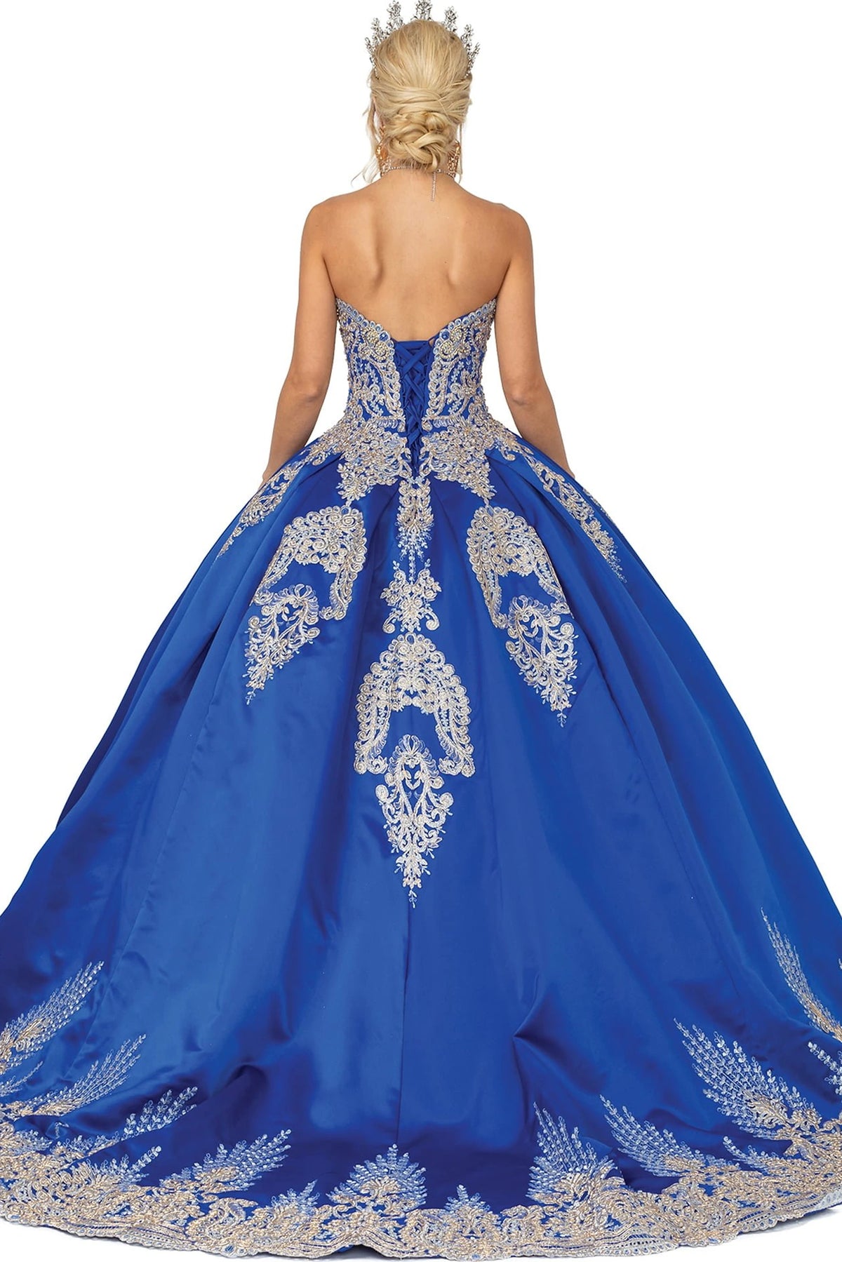 From the back, the Royal Blue quinceañera ball gown reveals its floor-length skirt.