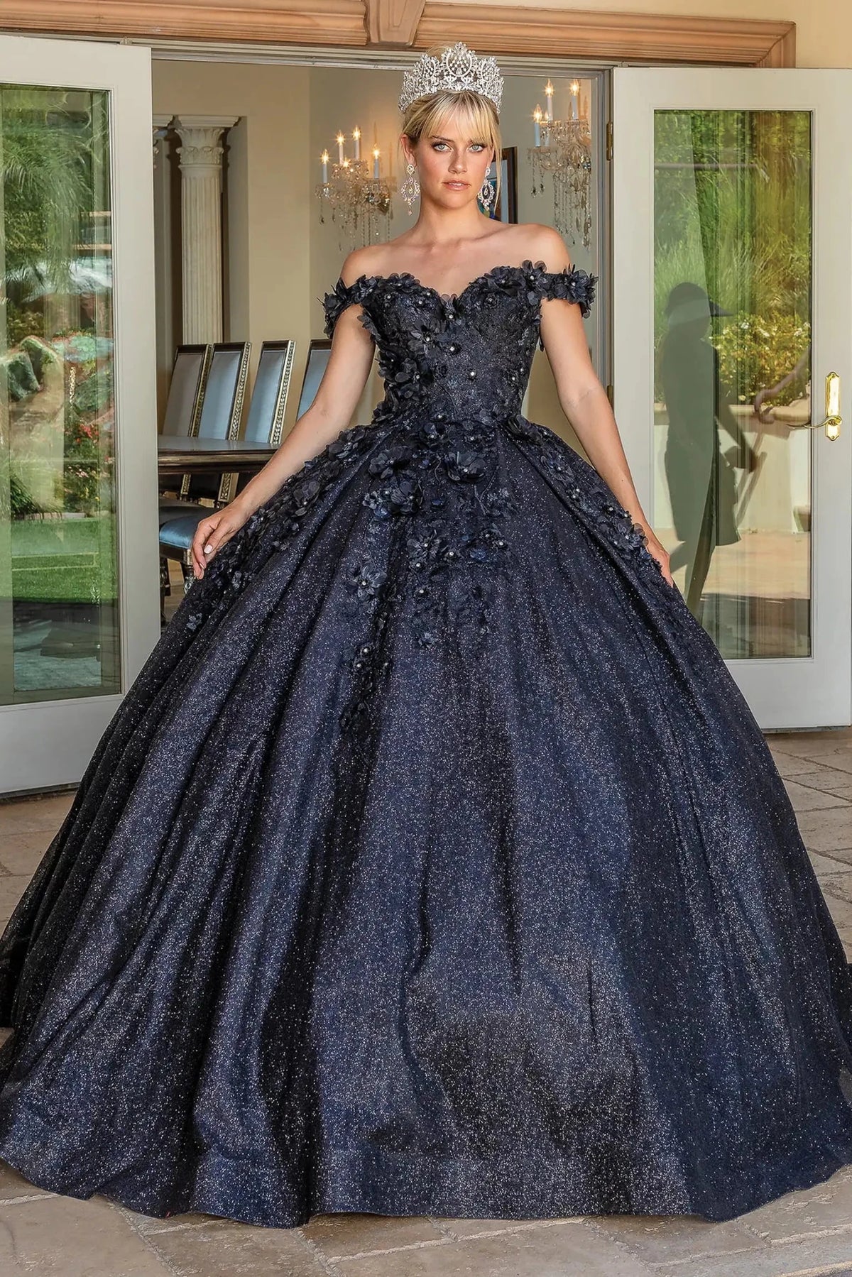 Front view of a Black quinceañera gown with off-the-shoulder neckline and beaded bodice
