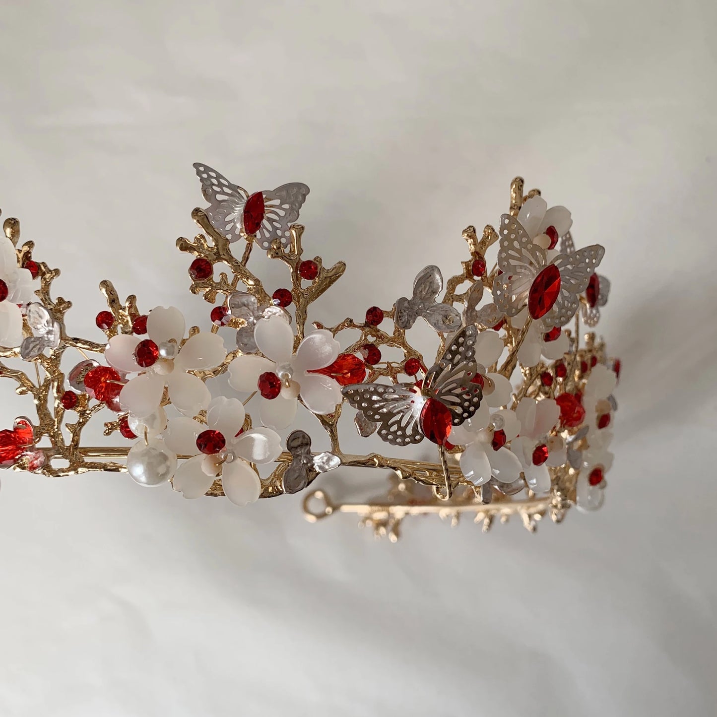 Red gold butterfly floral quinceañera tiara.