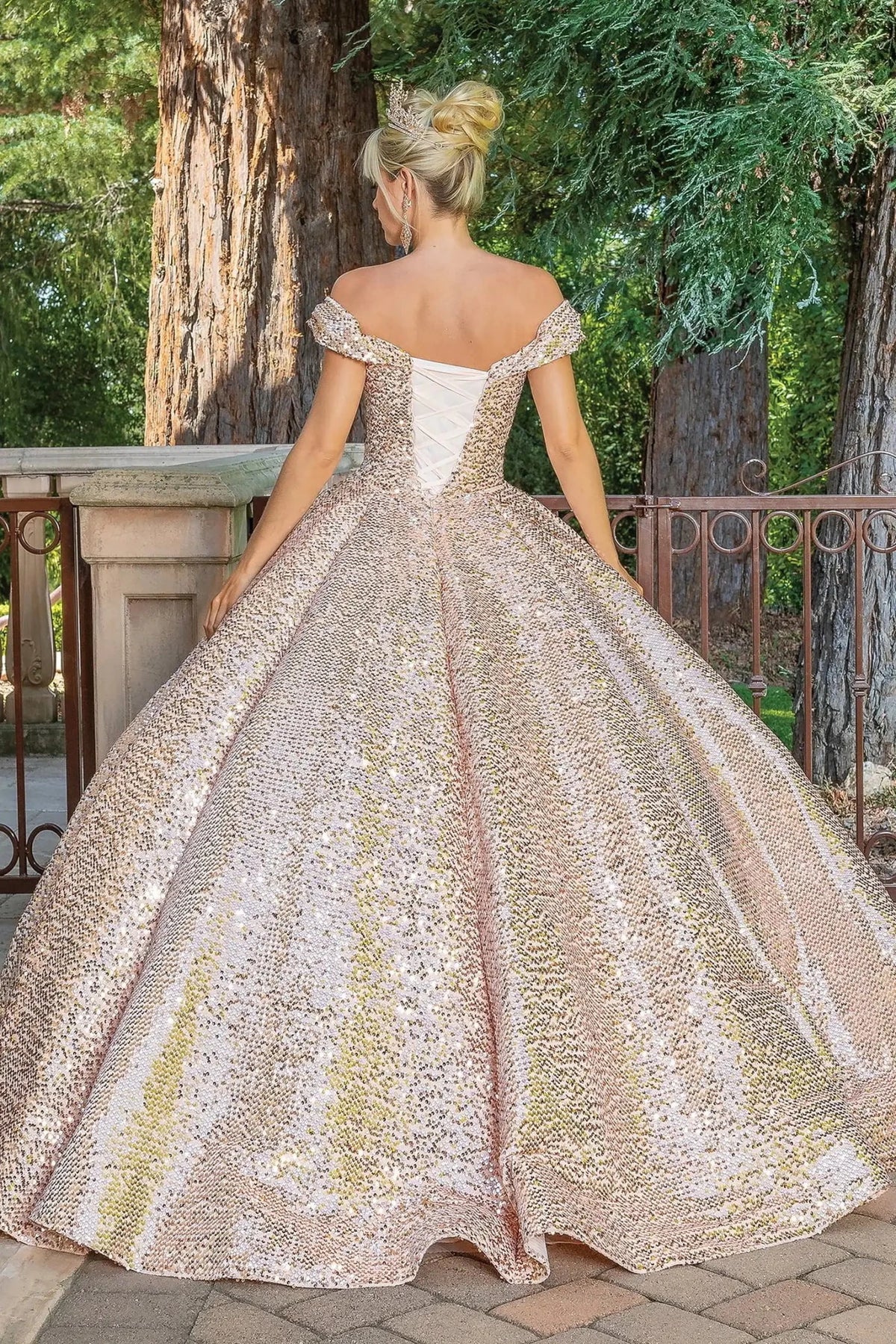 Additional full-length view of a Rose Gold quinceañera gown highlighting crystal accents and off-the-shoulder neckline