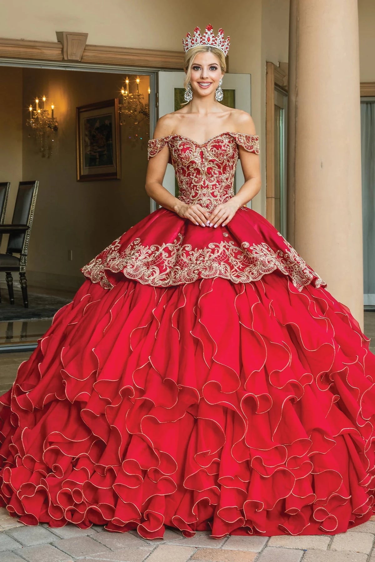 Front view of a Burgundy quinceañera gown with off-the-shoulder neckline, beaded bodice, beaded embroidery, and cascading ruffle skirt