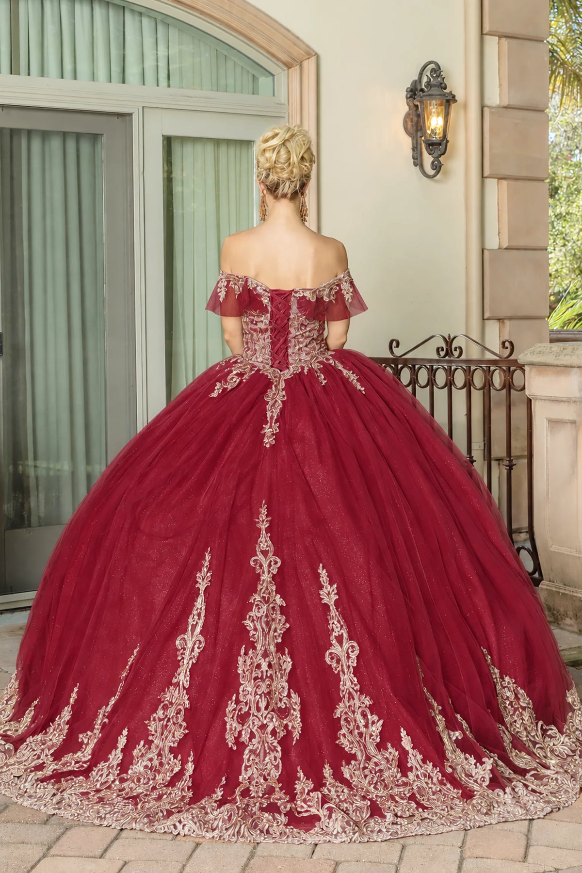 Burgundy embroidered quinceanera dress, back view with lace-up closure