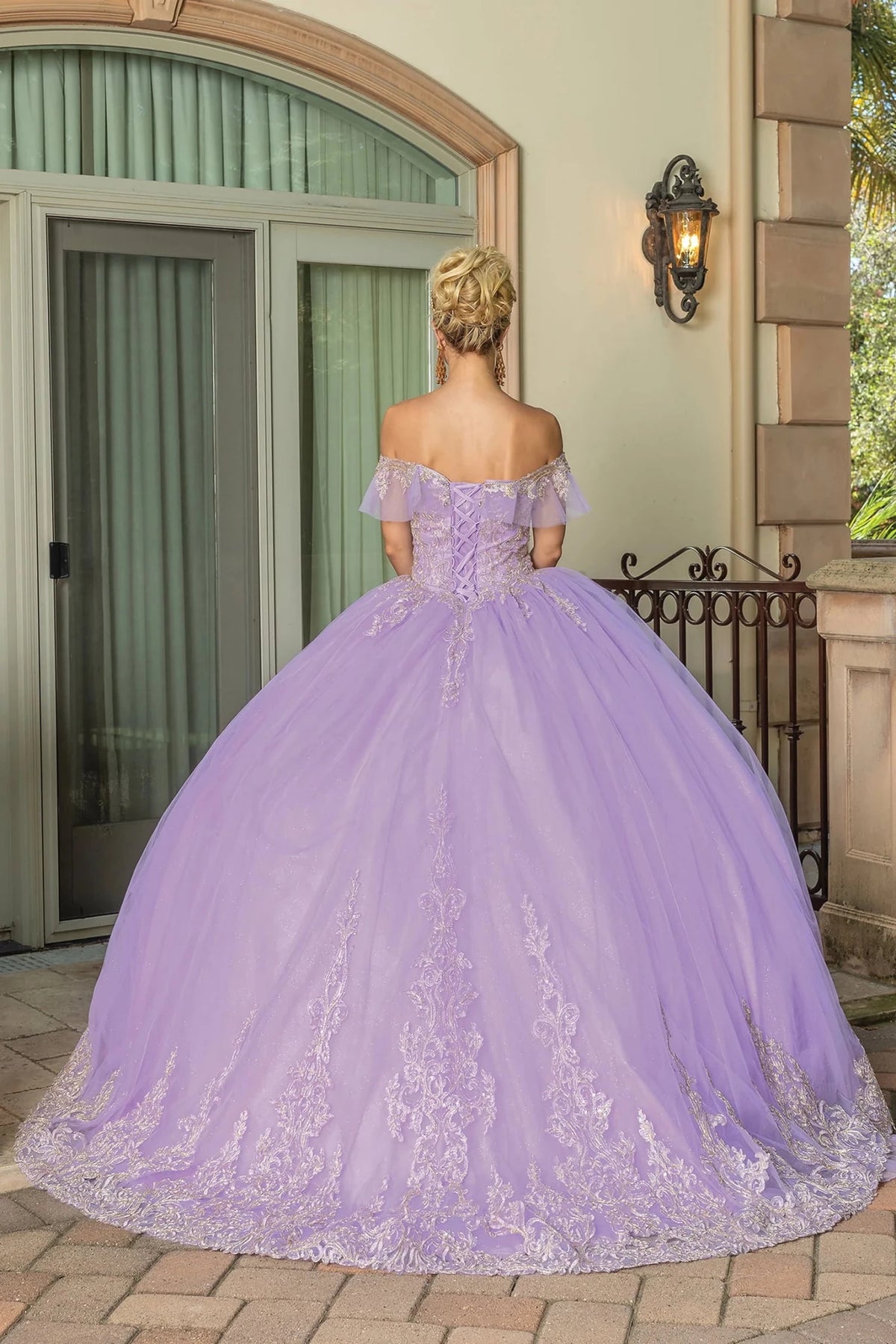 Second alternate full-length view of a Lilac quinceañera gown highlighting voluminous full skirt and off-the-shoulder neckline