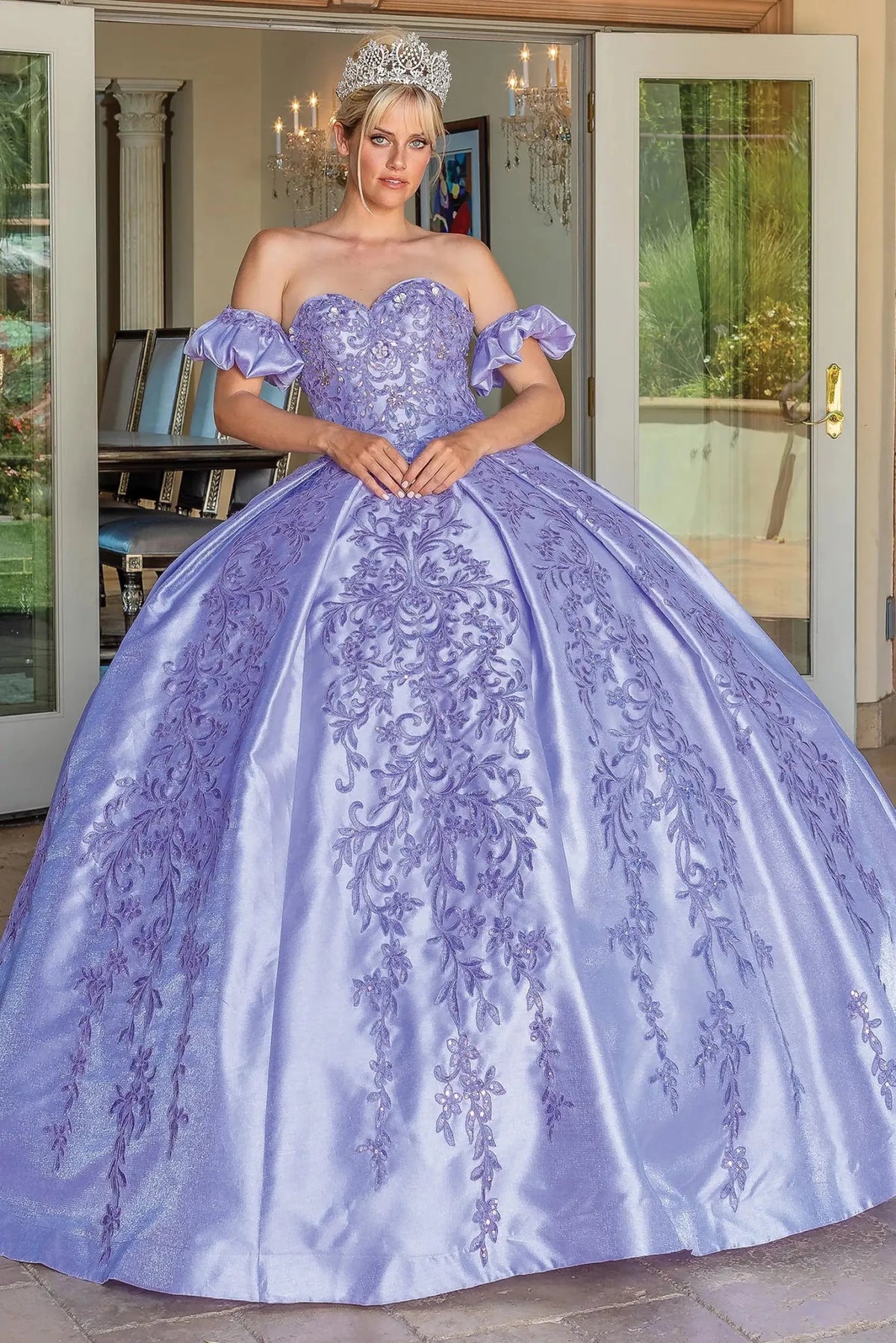 Front view of a Lilac quinceañera gown with embroidered lace