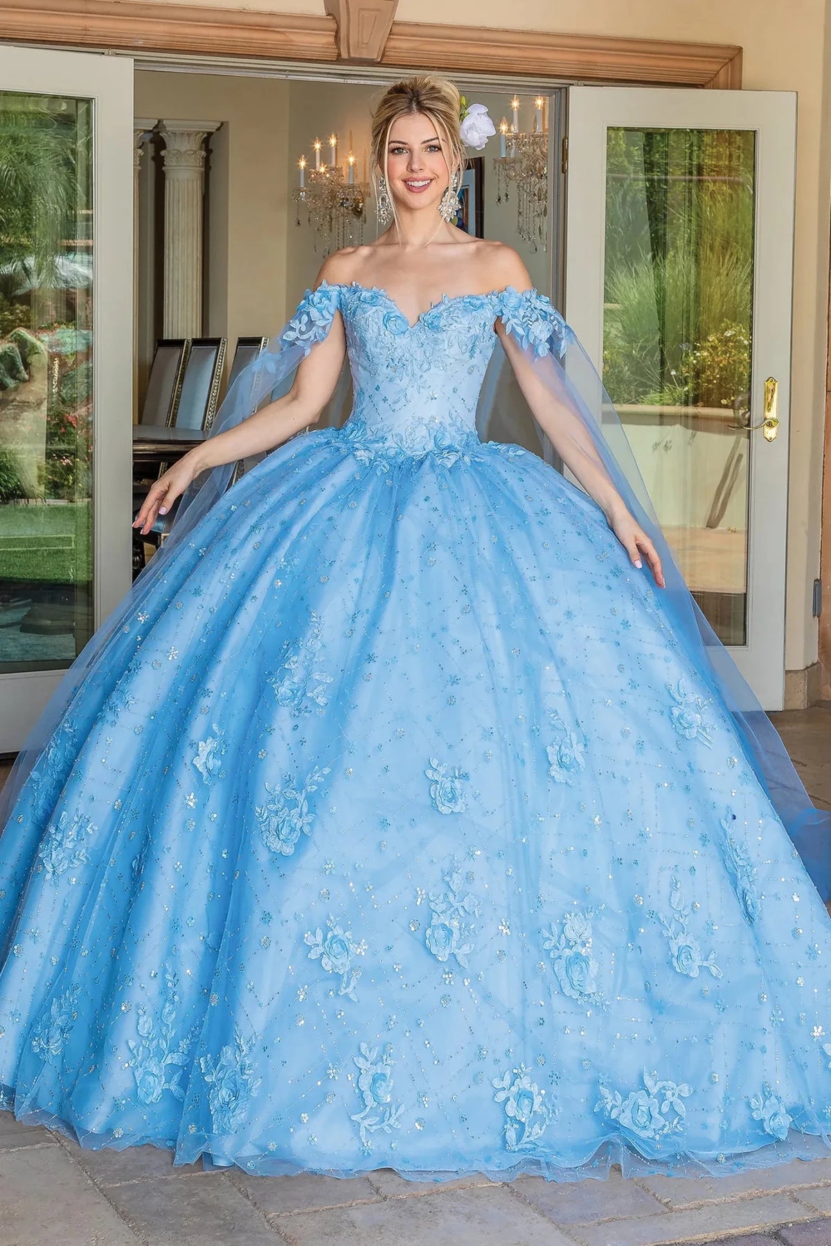 Front view of a Bahama Blue quinceañera gown with off-the-shoulder neckline and floral embroidery