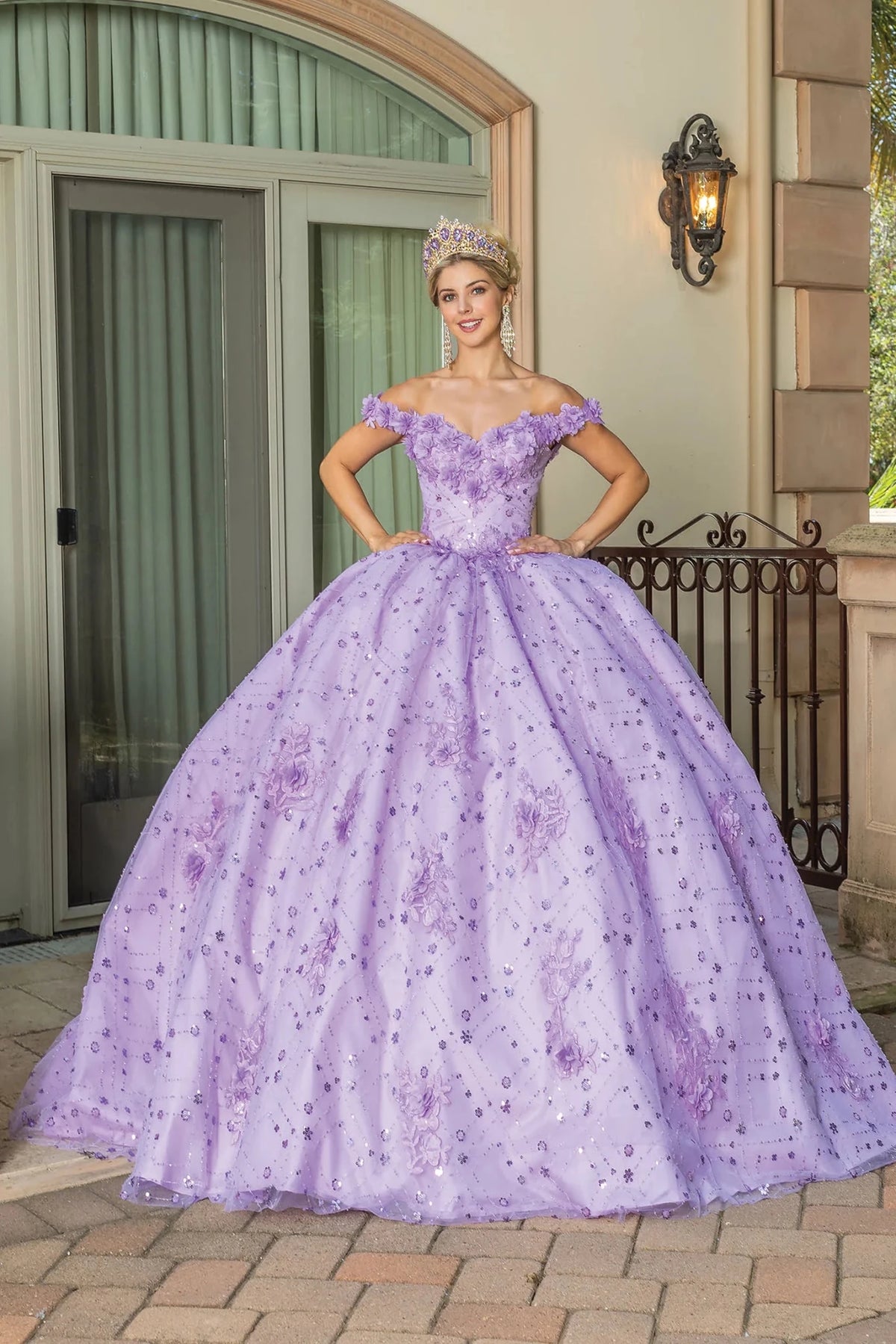 Front view of a Lilac quinceañera gown with off-the-shoulder neckline and floral embroidery