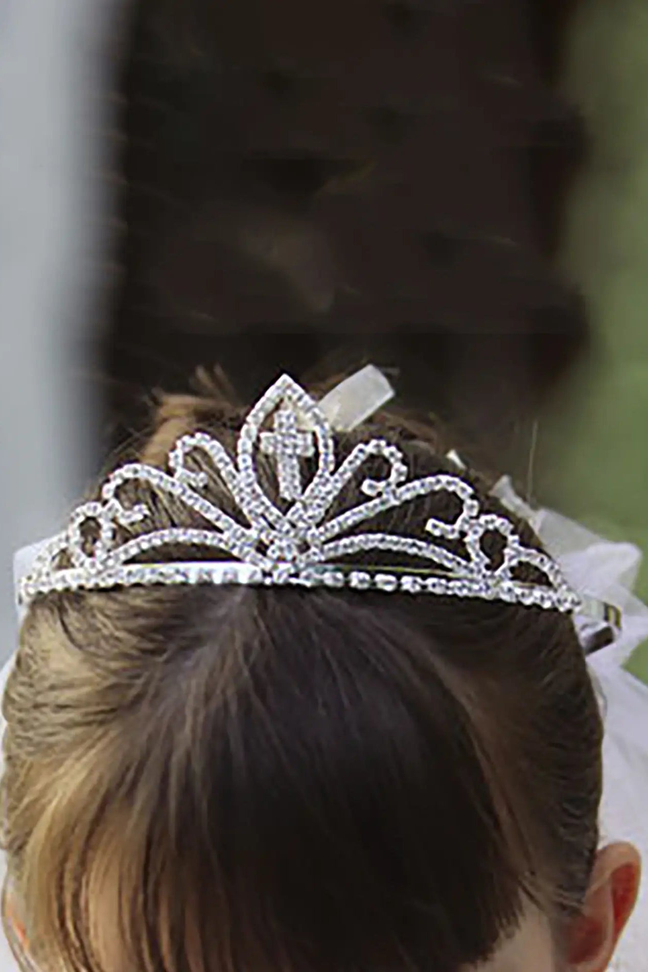 Silver rhinestone cross first communion tiara and two-tier veil.