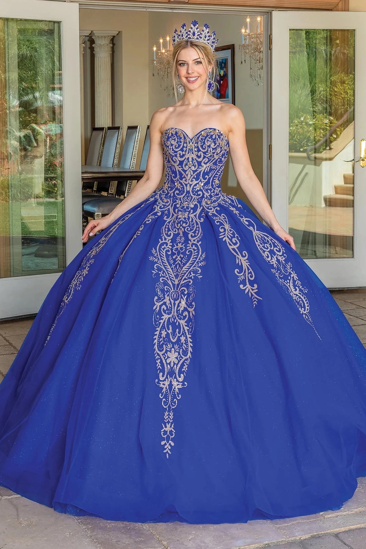Front view of a Royal Blue quinceañera gown with strapless neckline, beaded bodice, and full tulle skirt