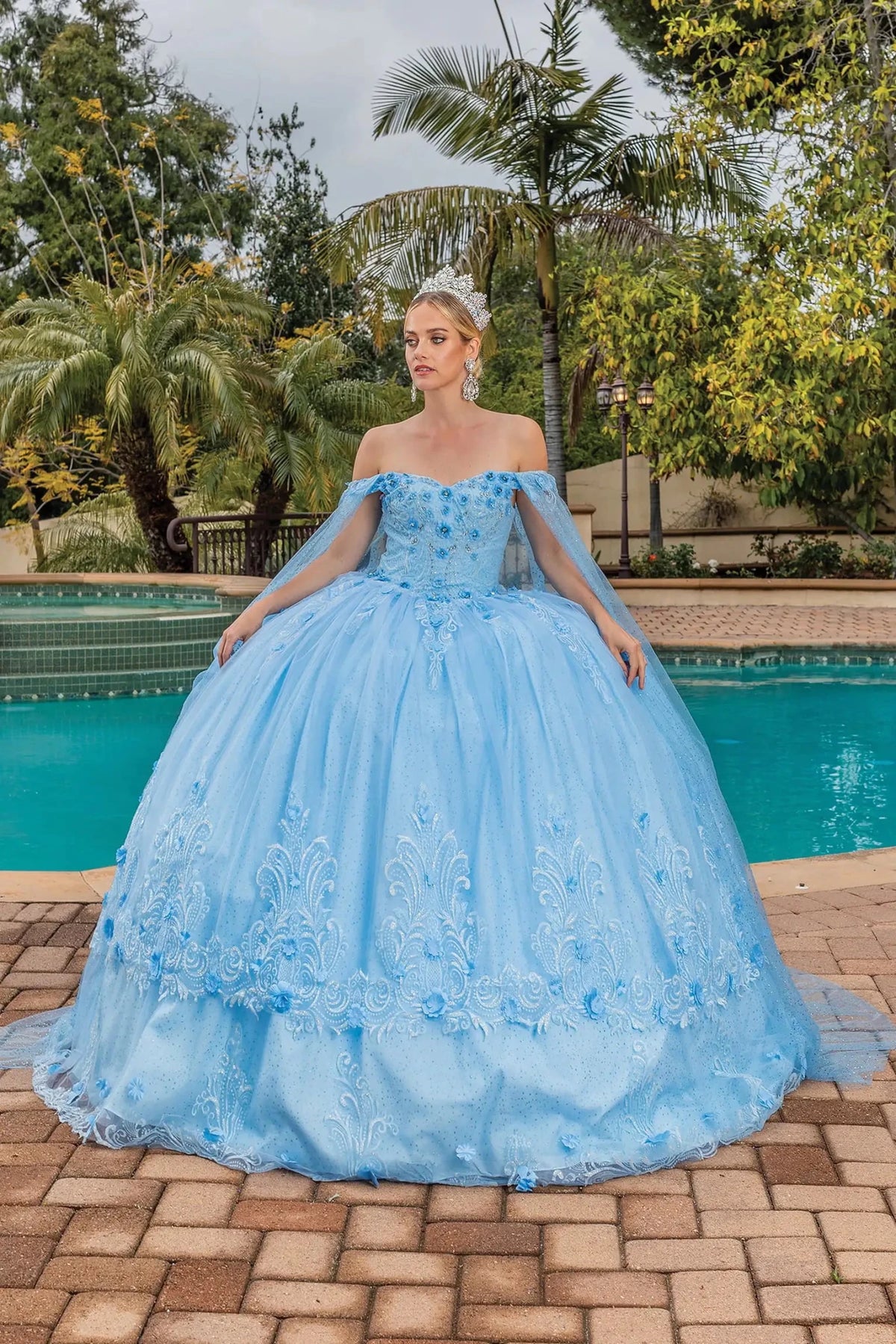 Bahama Blue quinceañera gown showing lace-up back and floral embroidery