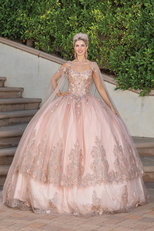 Showing floral embroidery and a scalloped tulle hem, this Rose Gold quinceañera ball gown is shown in full view.