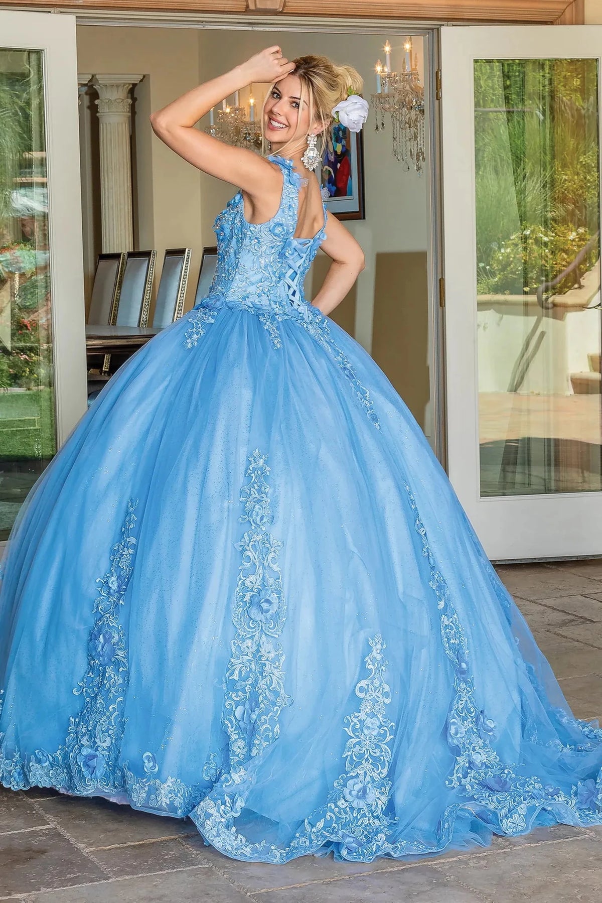 Additional full-length view of a Bahama Blue quinceañera gown highlighting voluminous full skirt and embroidered lace