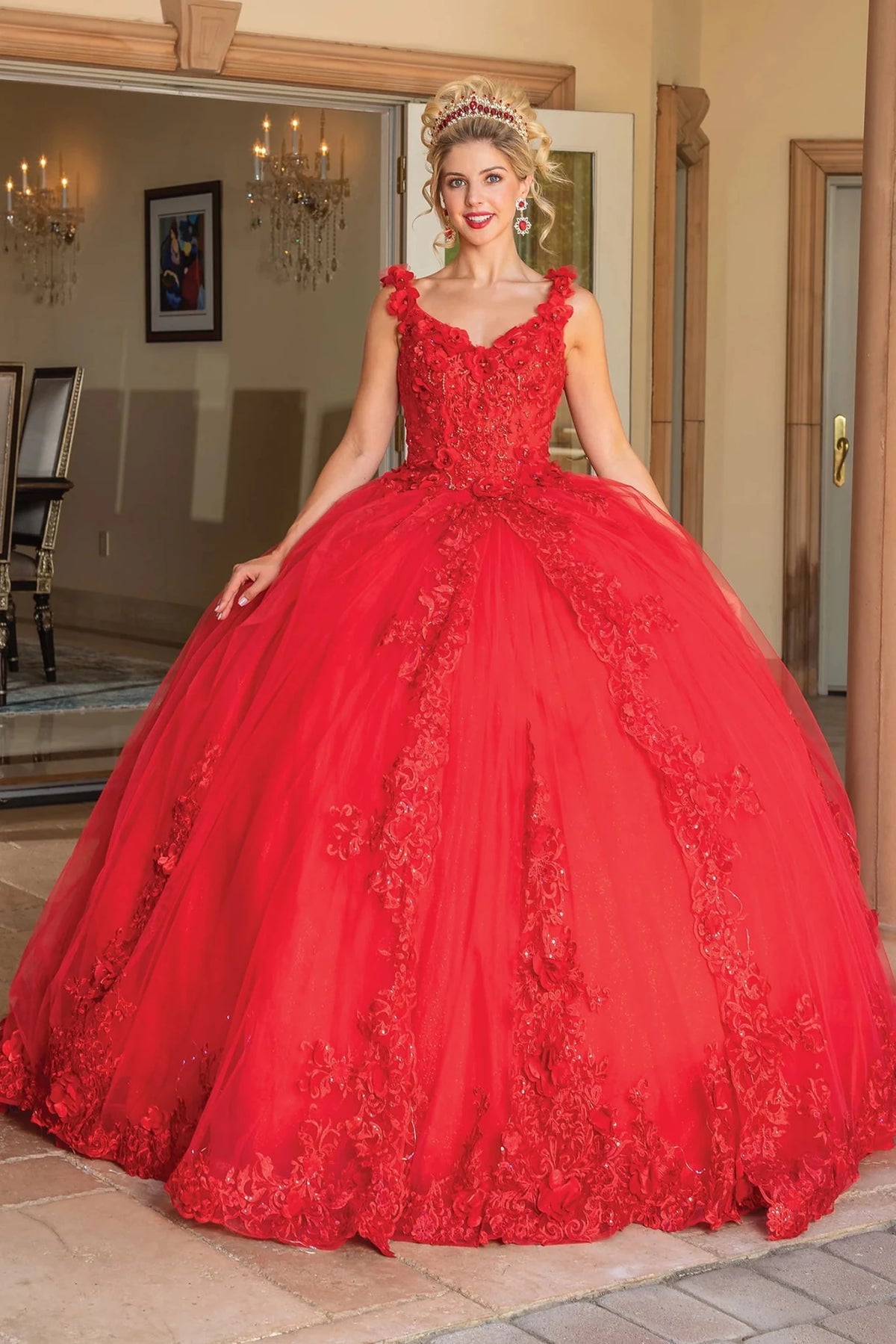 Front view of a Red quinceañera gown with beaded bodice, embroidered lace, and voluminous full skirt