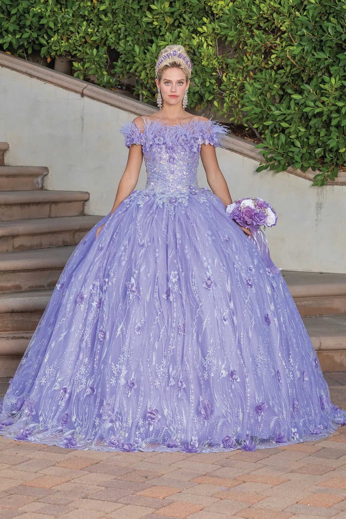 Front view of a Lilac quinceañera gown with off-the-shoulder neckline, embellished bodice, and glitter tulle skirt