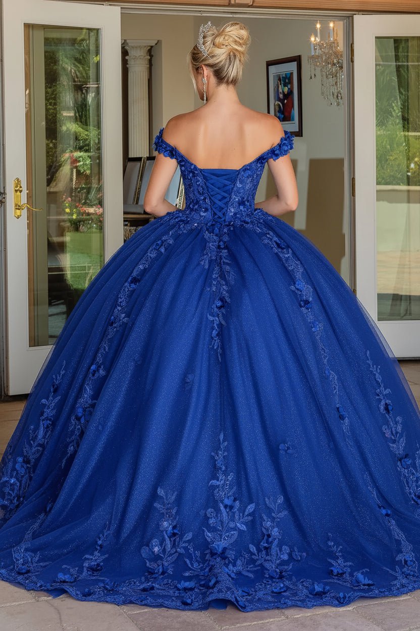 Back view of a Royal Blue quinceañera gown showing lace-up back and floral embroidery
