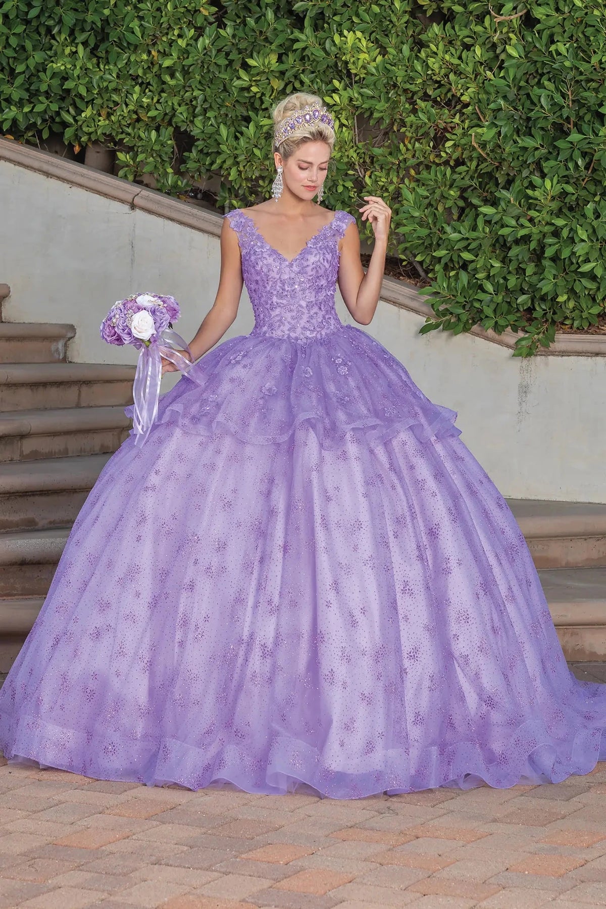 Front view of a Lilac quinceañera gown with floral appliqués