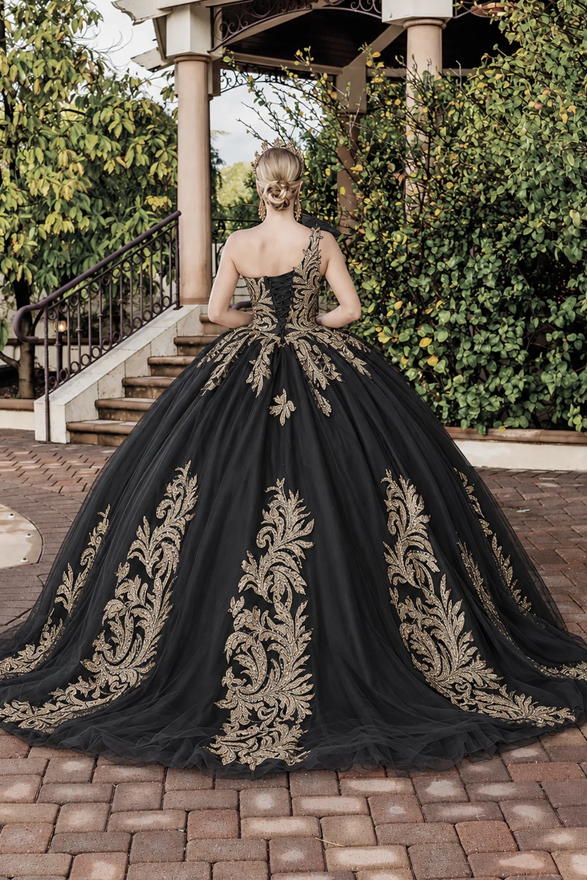 Black embroidered quinceanera dress, back view with lace-up closure