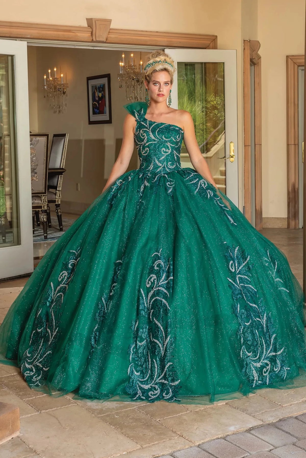 Front view of a Hunter Green quinceañera gown with one-shoulder neckline and embroidered tulle skirt