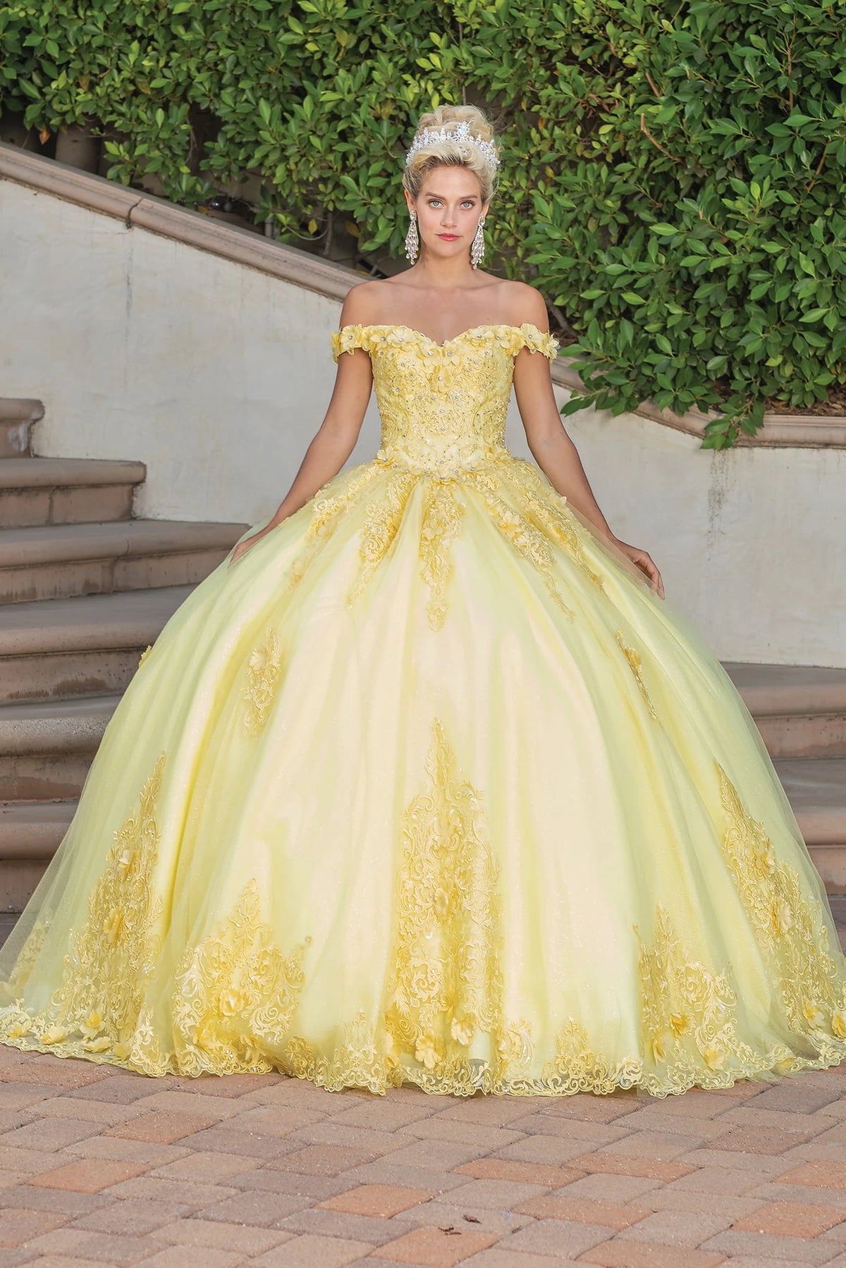 Featuring a floor-length skirt, this Yellow quinceañera ball gown is shown in full view.