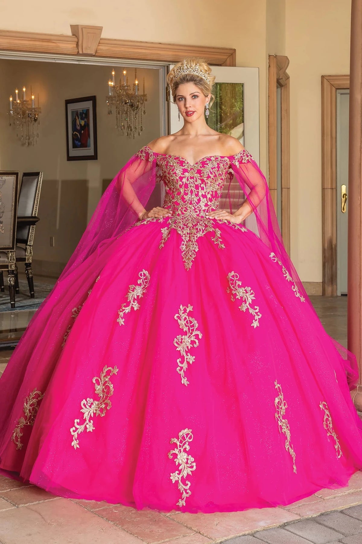 Front view of a Fuchsia quinceañera gown with off-the-shoulder neckline and floral embroidery