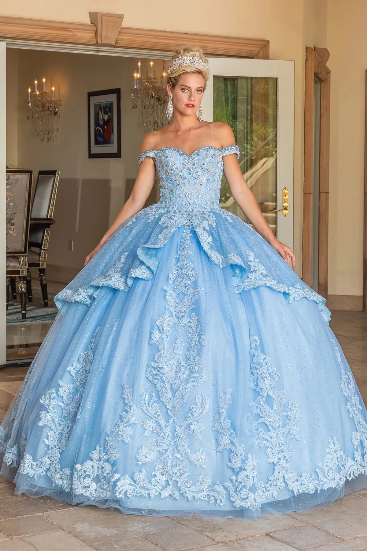 Front view of a Bahama Blue quinceañera gown with beaded corset bodice and embroidered tulle skirt
