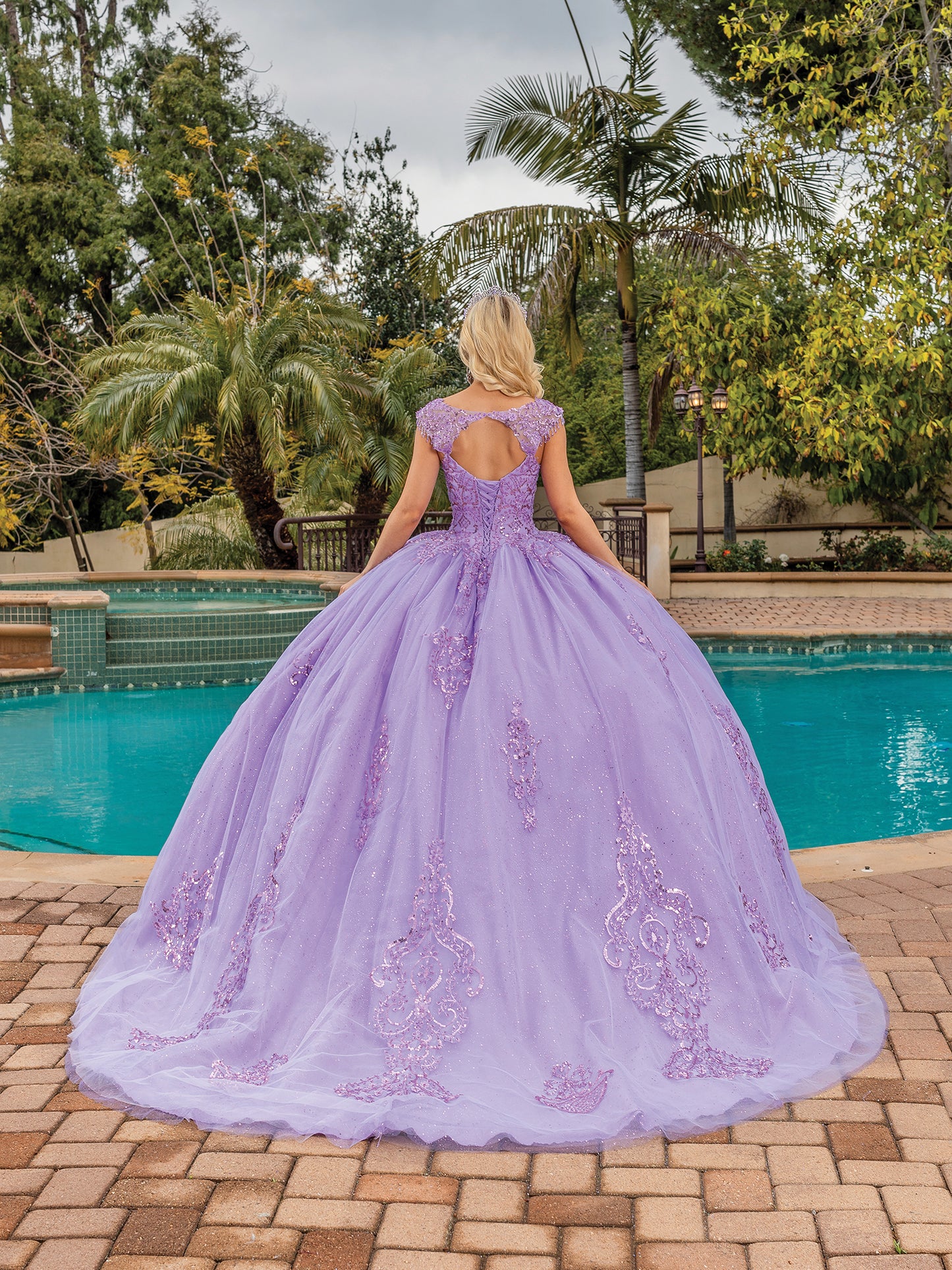 Lilac Beaded Lace Bodice Keyhole Back Ballgown with Full Tulle Skirt Quince dress - back view of woman wearing dress