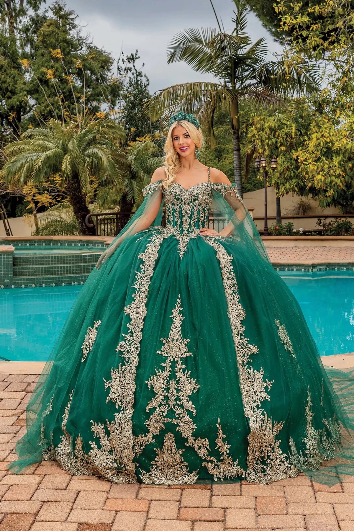 Front view of a Hunter Green quinceañera gown with off-the-shoulder neckline and crystal accents