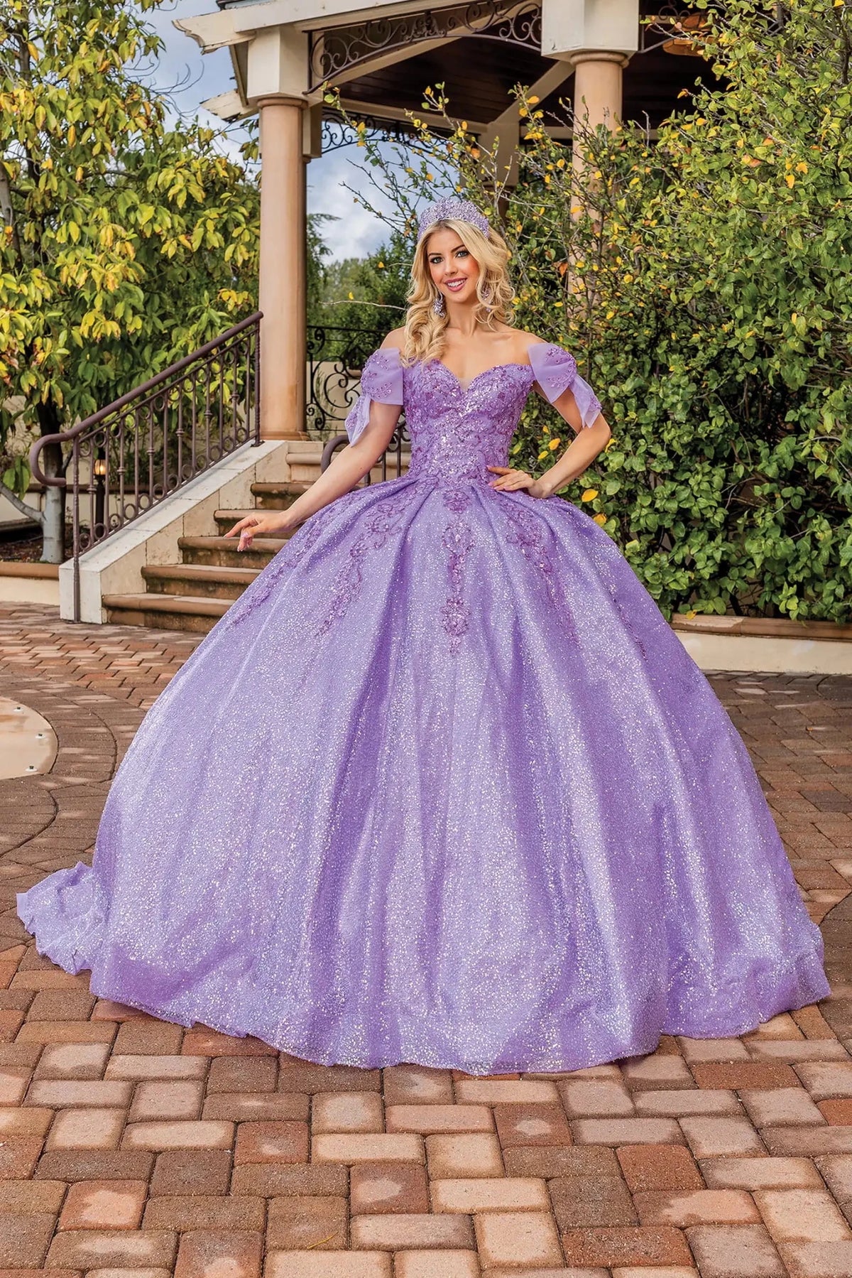 Front view of a Lilac quinceañera gown with cap sleeves and embroidered bodice