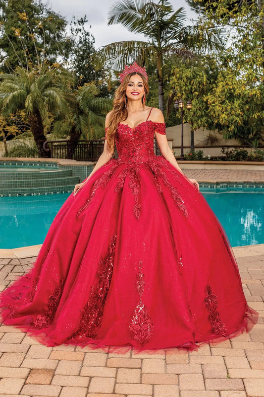 Front view of a Burgundy quinceañera gown with off-the-shoulder neckline, corset bodice, lace appliqués, and voluminous full skirt