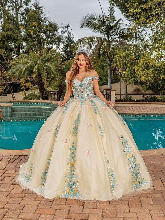 Quinceanera | Off-the-Shoulder Crystal Embellished Lace Appliqués, Beaded Butterflies, and Tulle Skirt Quinceanera dress - front view of woman wearing dress standing in front of pool