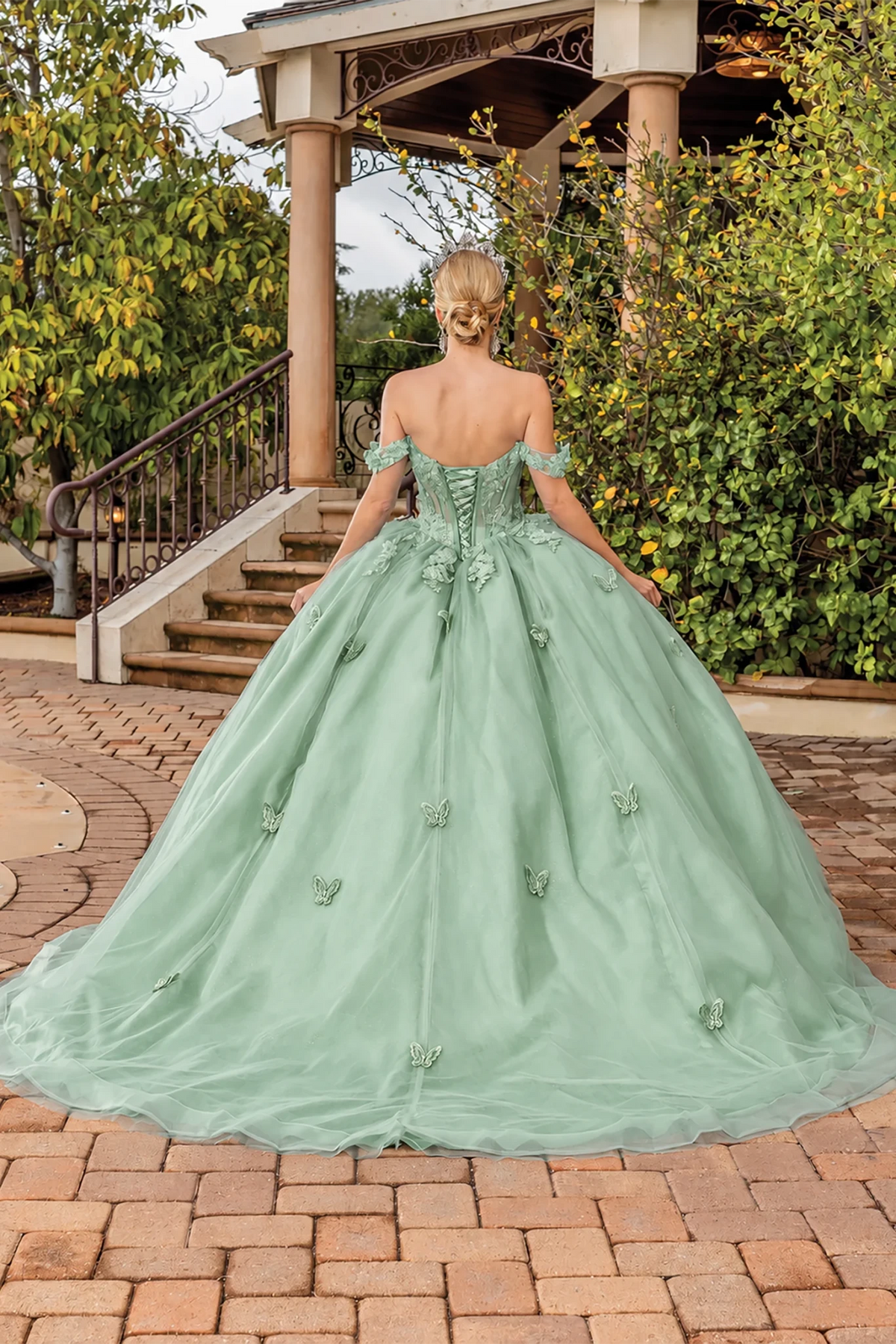 Sage floral appliqué quinceanera dress, back view with lace-up closure