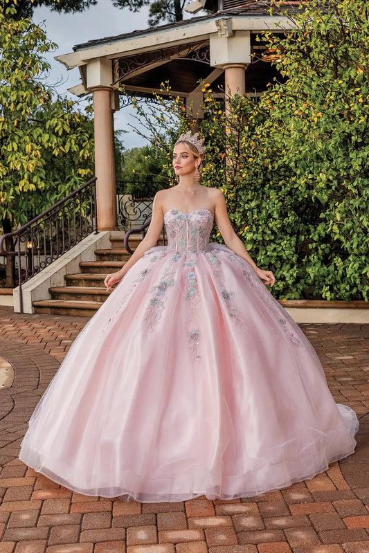 Front view of a Blush quinceañera gown with floral embroidery