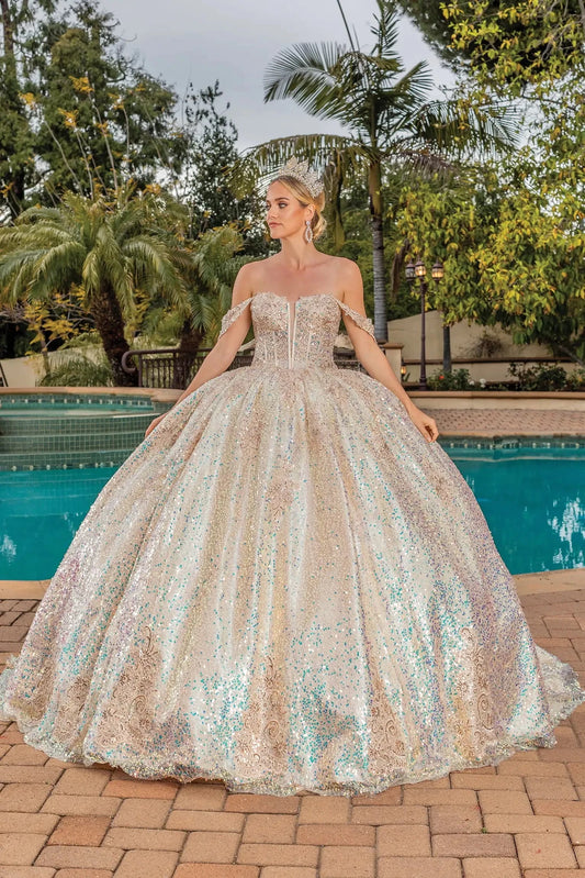 Showing iridescent sequins covering its full ball skirt, this Multi Champagne quinceañera ball gown is shown in full view.
