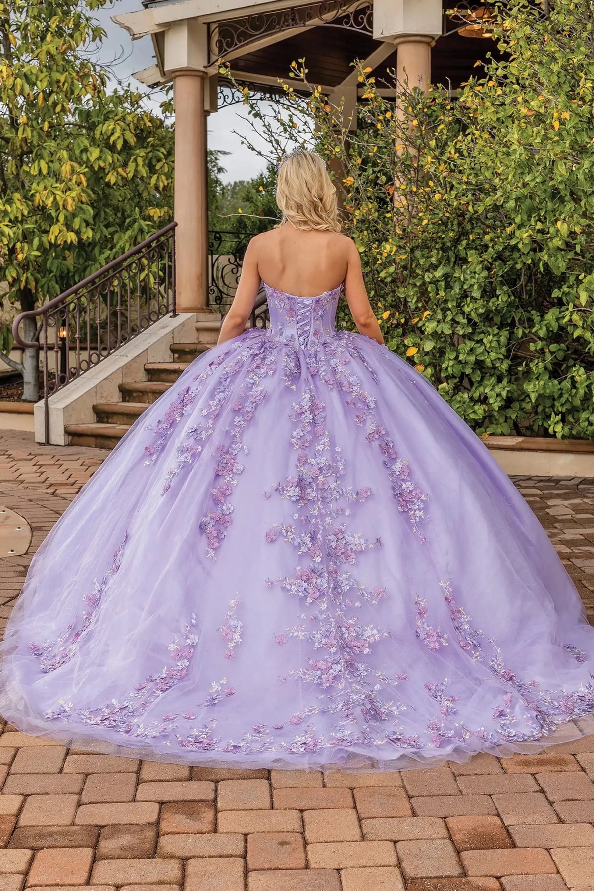 Back view of a Lilac quinceañera gown showing lace-up back