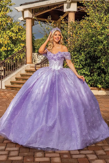 Front view of a lilac off-shoulder quinceañera ball gown with structured corset bodice, delicate embroidered patterns, glitter tulle skirt, and a full princess silhouette in an outdoor garden setting.