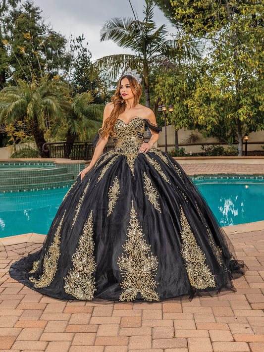 Black Gold Embroidered Bodice with Sheer Long Sleeves Quince Ballgown Dress - Front view of woman wearing dress and a crown