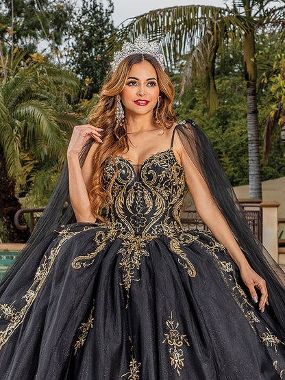 Quinceanera | Black Opulent Embroidered Gold Coiled Off-Shoulder Glittered tulle Ballgown with Dramatic Train - zoomed in front view of woman wearing dress