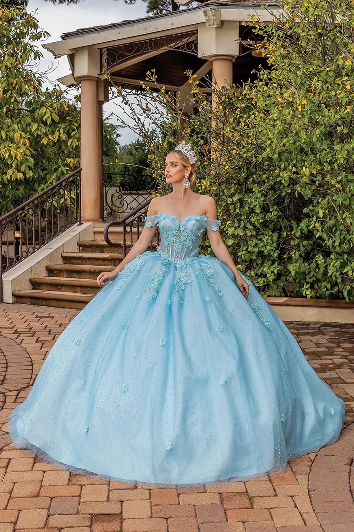 Front view of an Aqua quinceañera gown with off-the-shoulder neckline, beaded lace bodice, and glitter tulle skirt