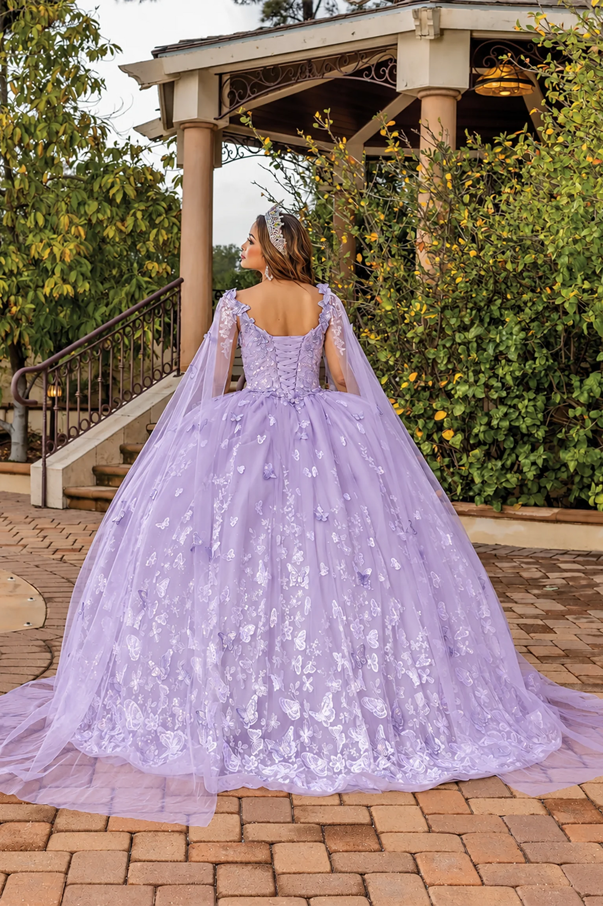 Lilac butterfly appliqué quinceanera dress, back view with lace-up closure