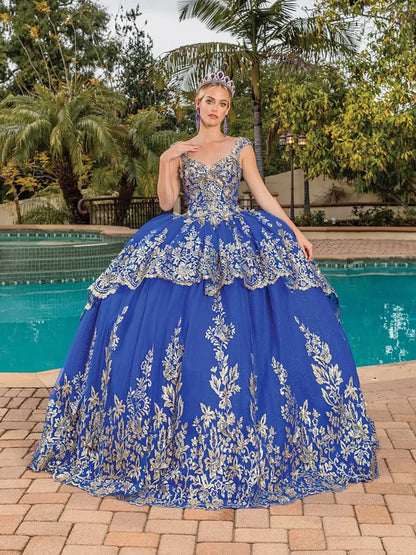 Front view of royal blue quinceañera ball gown featuring sleeveless V-neck corset bodice, intricate gold embroidery, layered tulle skirt, and tiara styling photographed poolside