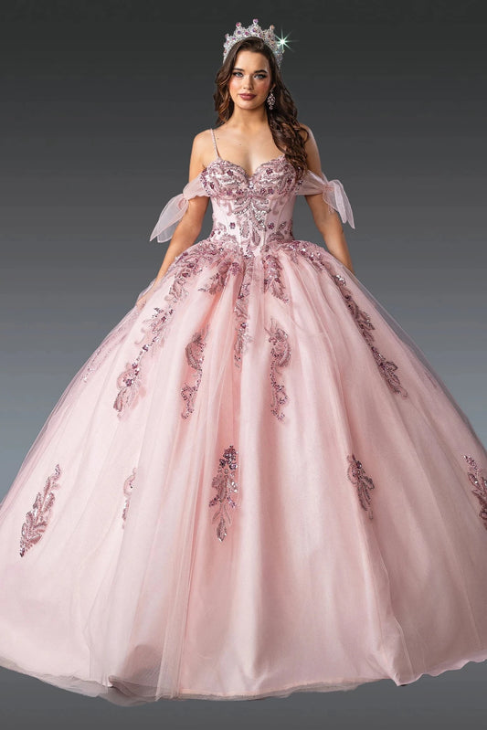 Front view of a Blush quinceañera gown with spaghetti straps, beaded bodice, and embroidered tulle skirt