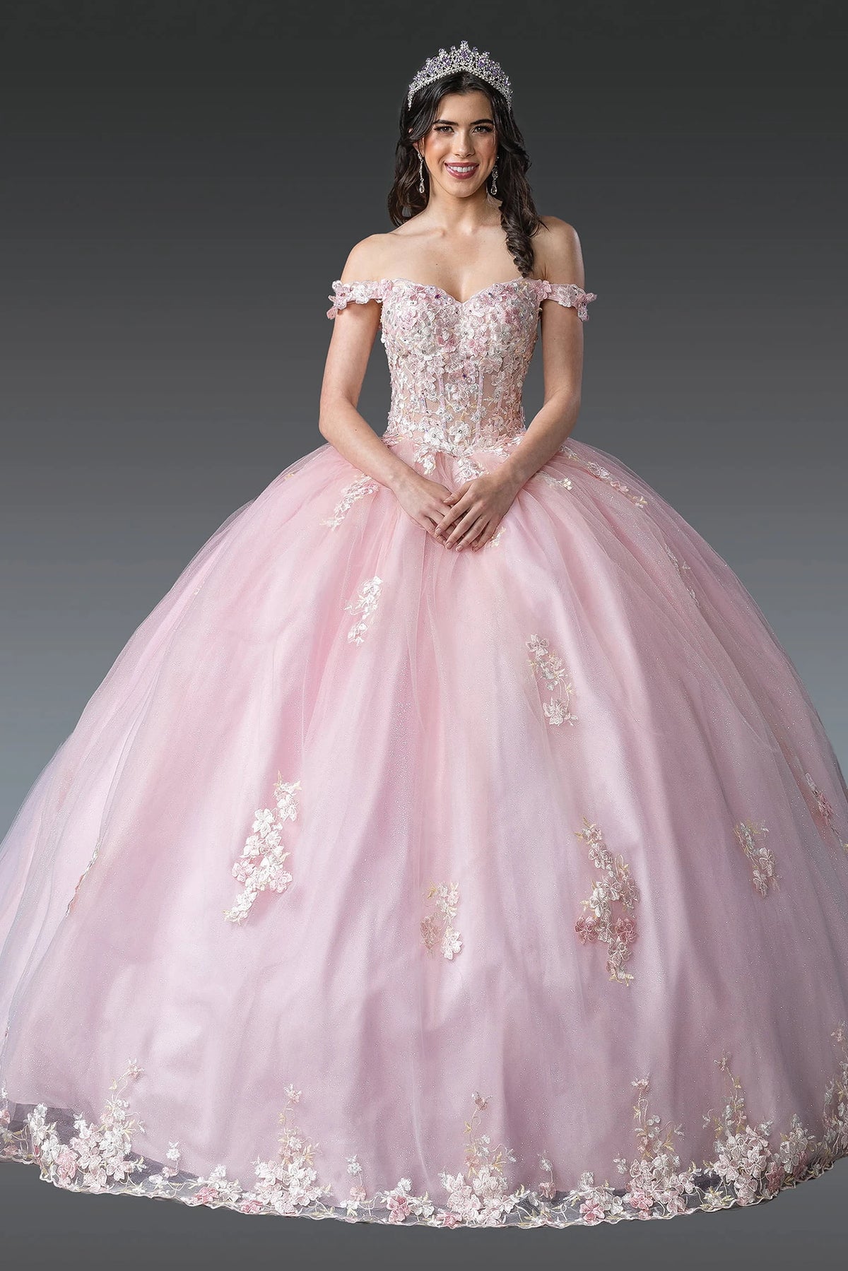 Front view of a Blush quinceañera gown with off-the-shoulder neckline and crystal accents