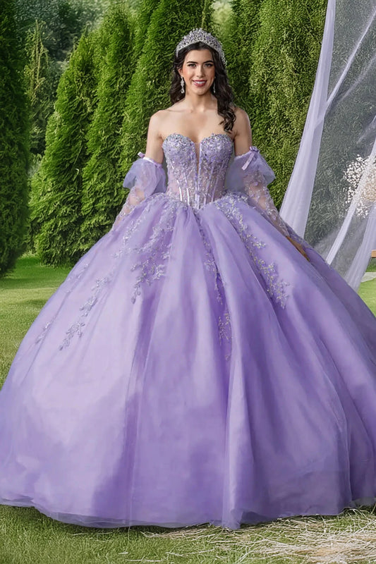 Woman in a lilac quinceball gown with floral details and long lace sleeves.