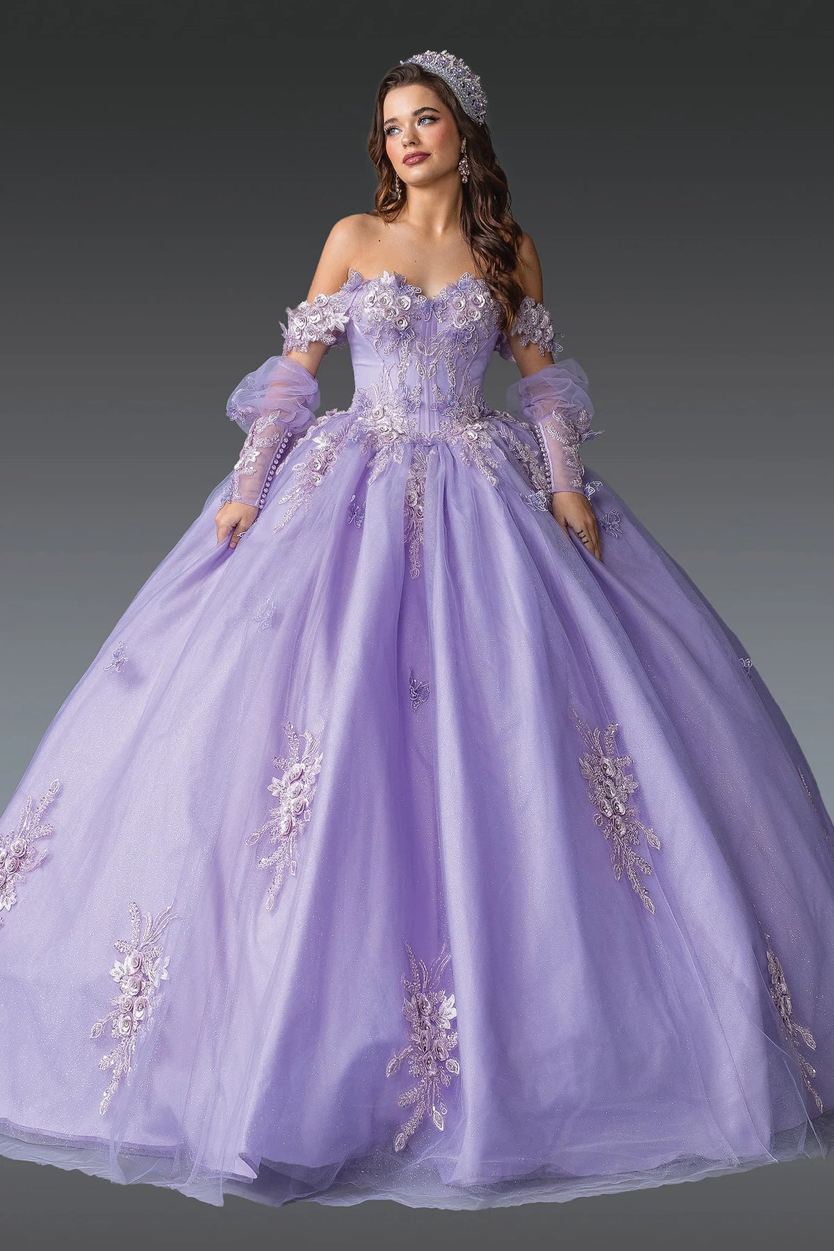 Full-skirt front view of a Lilac quinceañera gown with off-the-shoulder neckline and floral appliqués