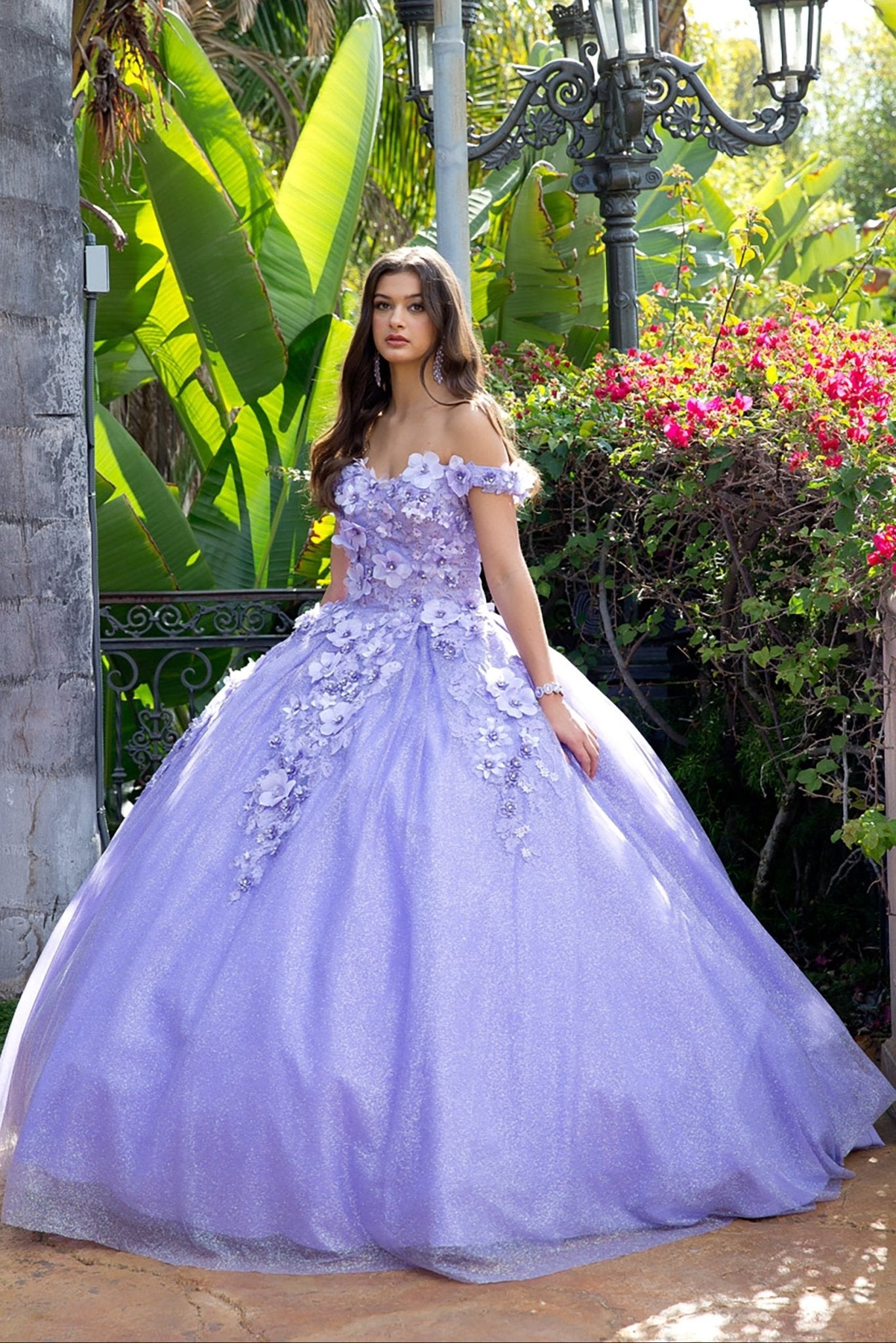 Woman in a Lilac floral quince dress standing in a garden setting