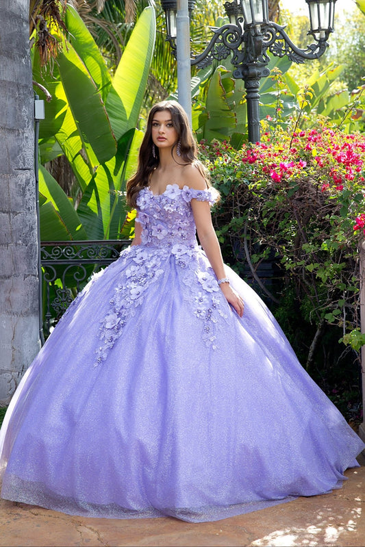 Woman in a Lilac floral quince dress standing in a garden setting