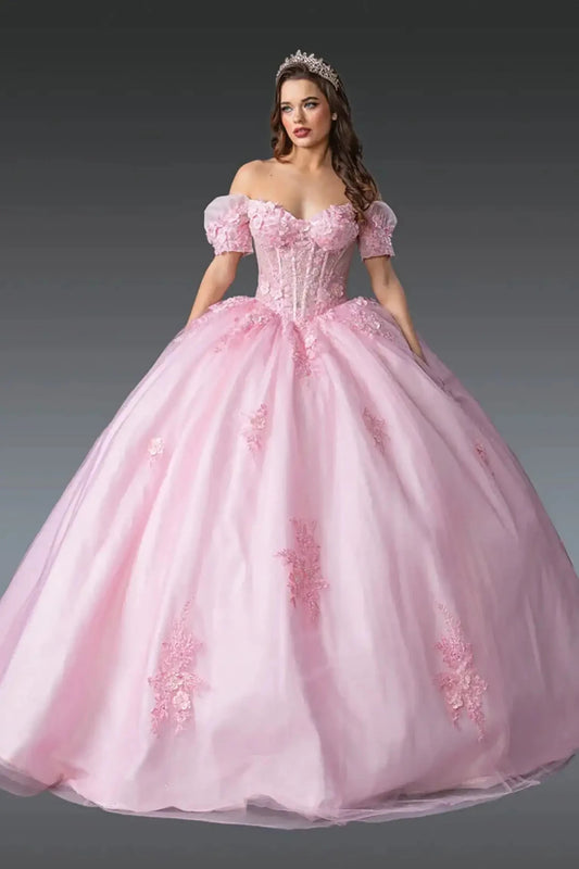 Front view of a pink quinceañera ball gown with off-shoulder puff sleeves, corset bodice, floral lace appliqués, and a voluminous tulle skirt.