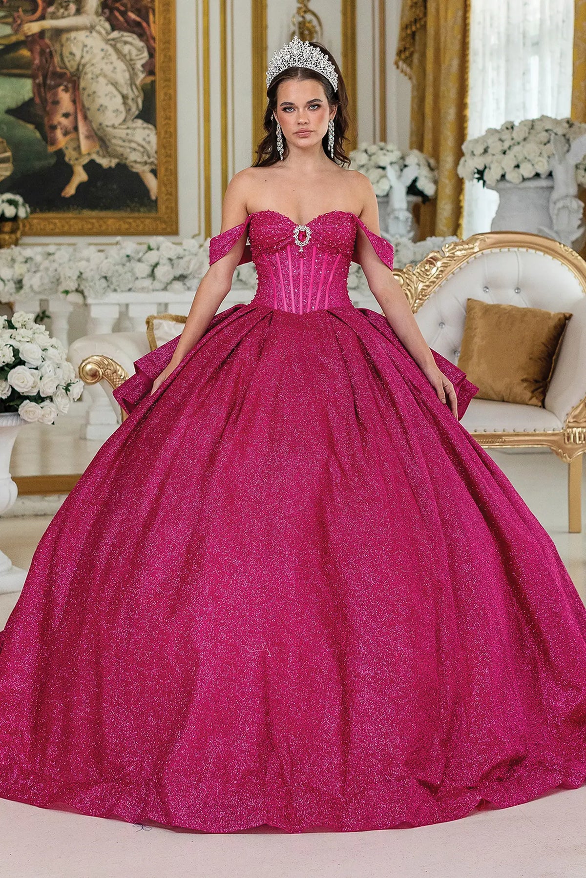 Front view of a Fuchsia quinceañera gown with strapless neckline and corset bodice