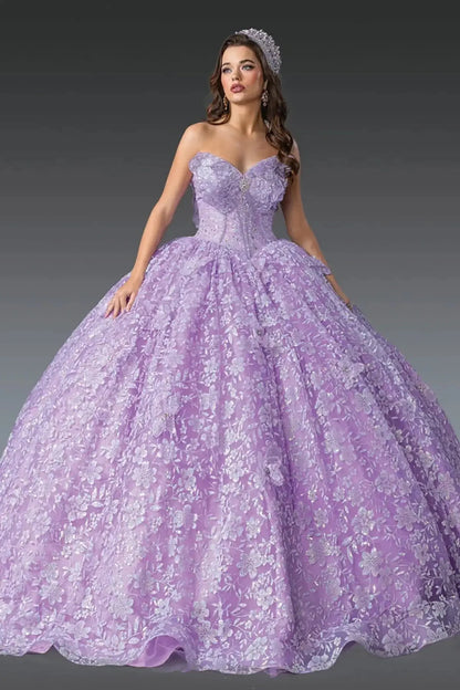 Front view of lilac quinceañera ball gown featuring strapless sweetheart corset bodice, full floral lace overlay, voluminous ball gown skirt, and tiara styling photographed in studio