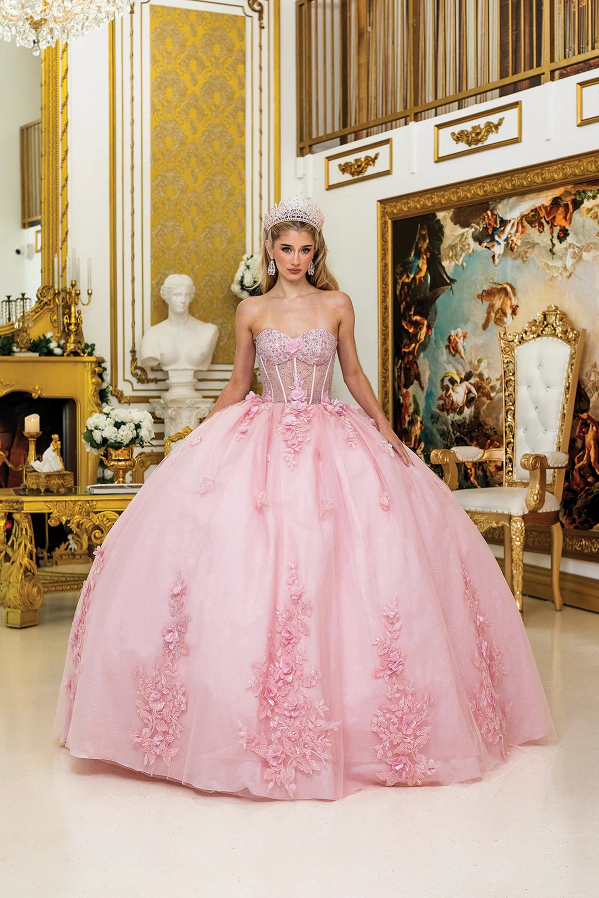 Front view of a Blush quinceañera gown with sweetheart neckline, puff sleeves, and floral embroidery
